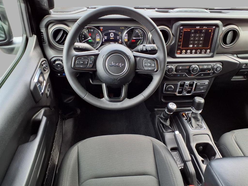 used 2023 Jeep Wrangler 4xe car, priced at $30,679