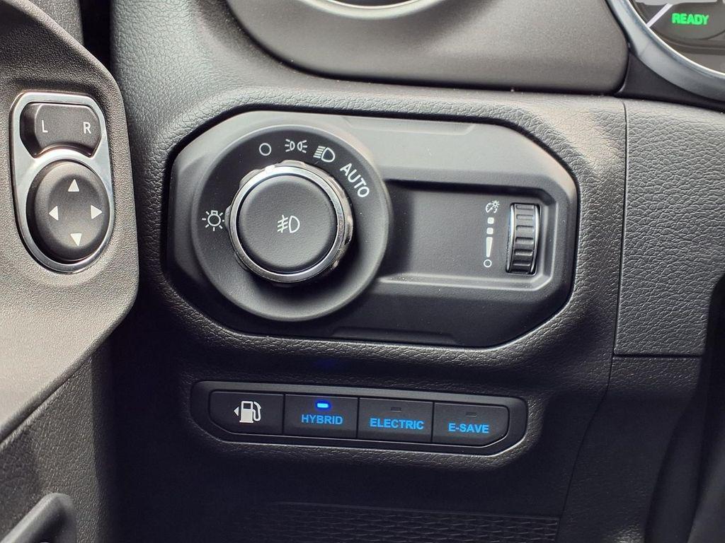 used 2023 Jeep Wrangler 4xe car, priced at $30,679