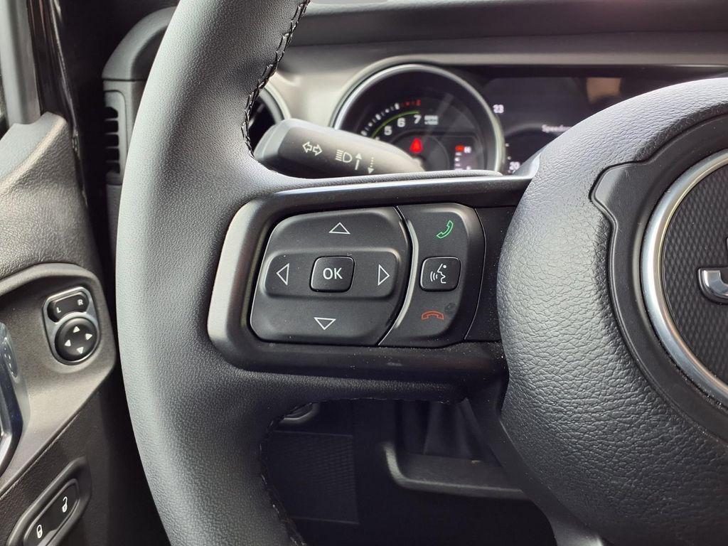 used 2023 Jeep Wrangler 4xe car, priced at $30,679