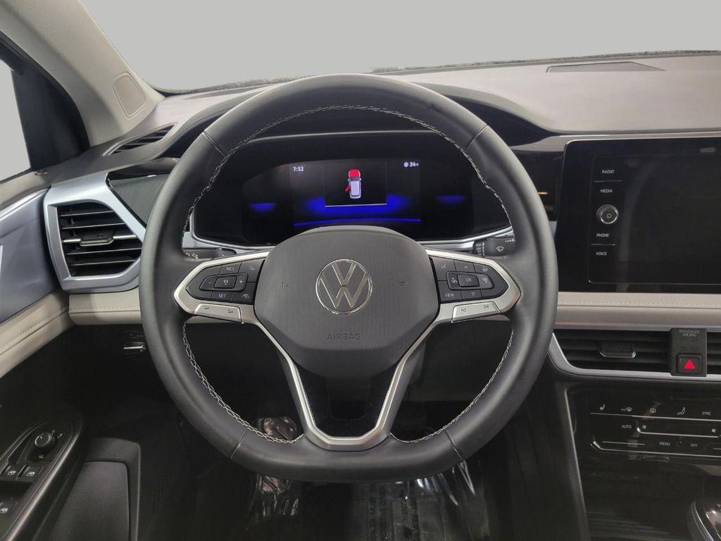 used 2025 Volkswagen Taos car, priced at $25,370