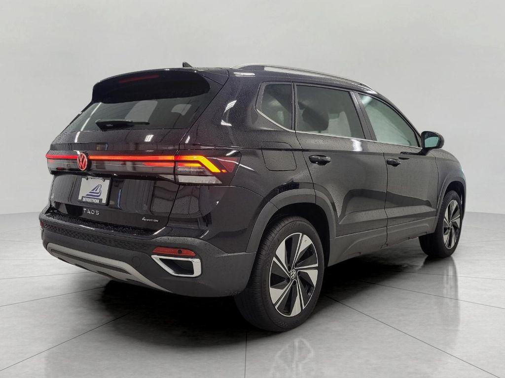 used 2025 Volkswagen Taos car, priced at $25,370