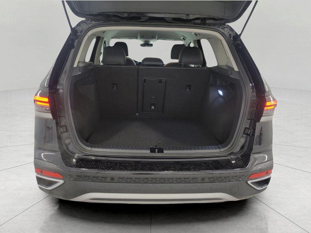used 2025 Volkswagen Taos car, priced at $25,370