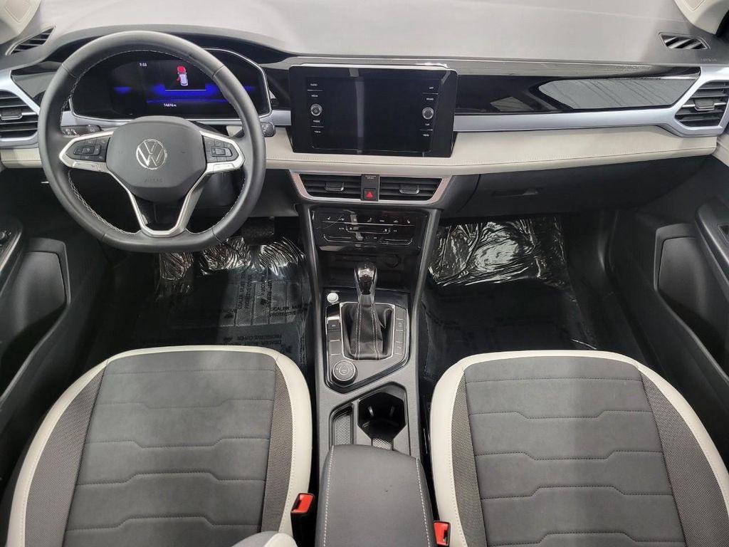 used 2025 Volkswagen Taos car, priced at $25,370