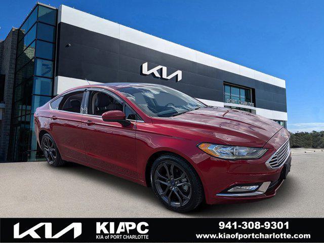 used 2018 Ford Fusion car, priced at $12,771