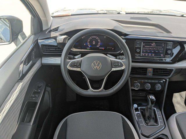 used 2023 Volkswagen Taos car, priced at $19,407