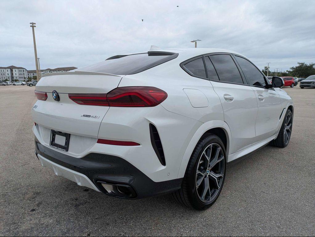 used 2023 BMW X6 car, priced at $55,487