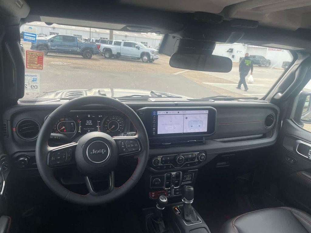 used 2024 Jeep Wrangler car, priced at $45,120