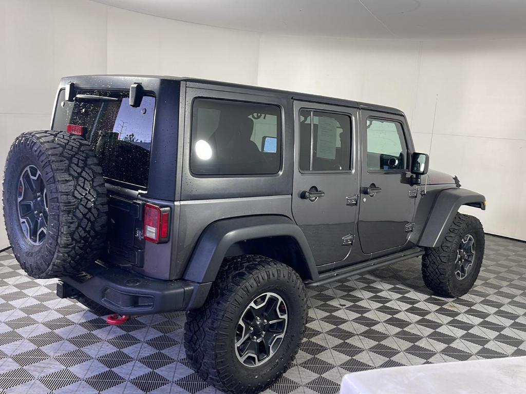 used 2014 Jeep Wrangler Unlimited car, priced at $17,695