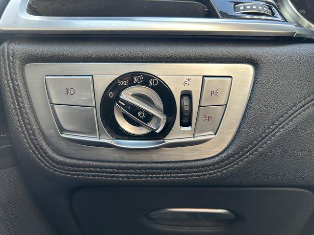 used 2016 BMW 750 car, priced at $15,000