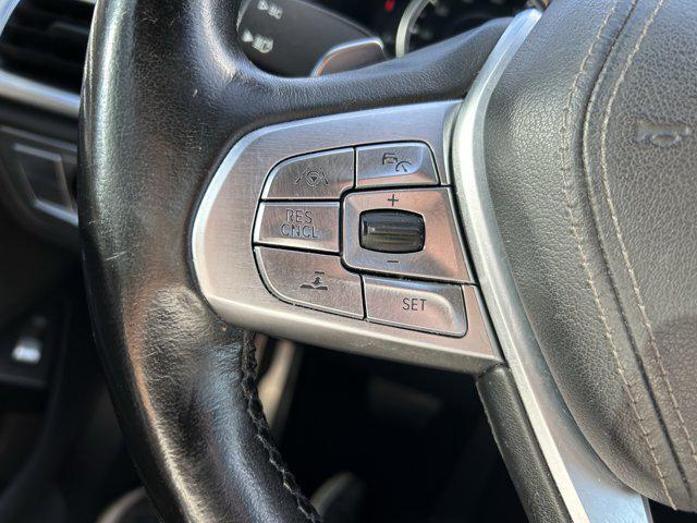 used 2016 BMW 750 car, priced at $15,000