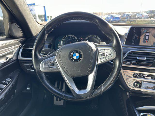 used 2016 BMW 750 car, priced at $15,000