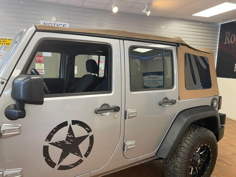 used 2015 Jeep Wrangler Unlimited car, priced at $10,888