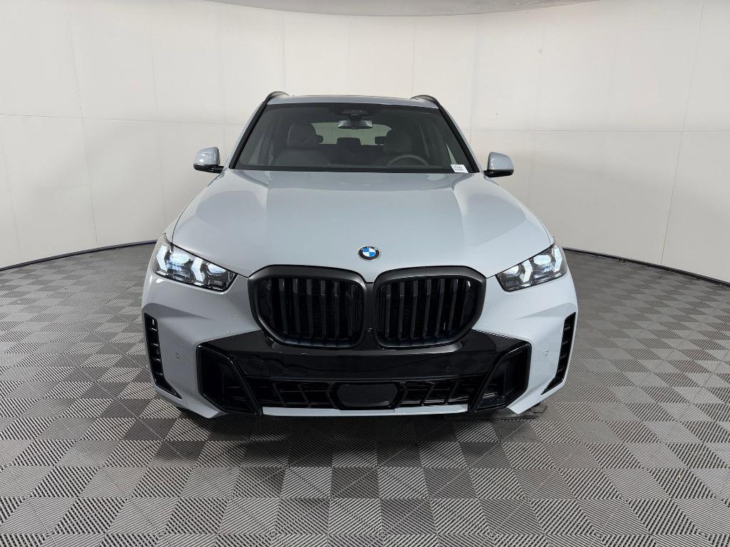 new 2026 BMW X5 car, priced at $85,000