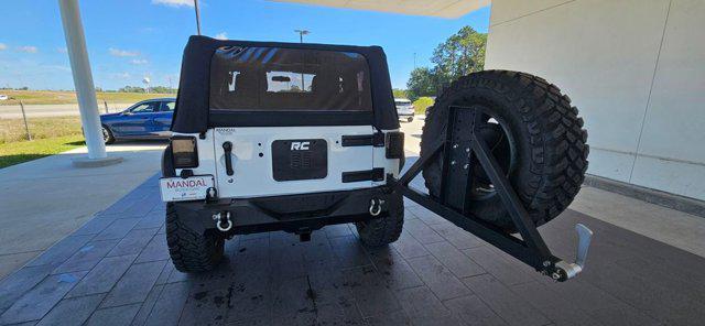 used 2013 Jeep Wrangler car, priced at $13,888