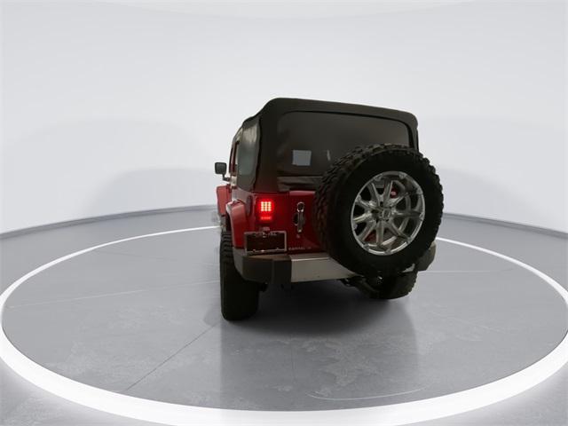 used 2014 Jeep Wrangler Unlimited car, priced at $17,880