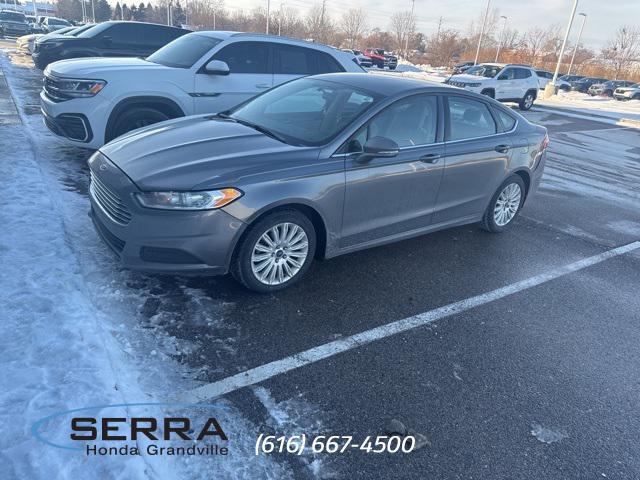 used 2014 Ford Fusion Hybrid car, priced at $4,990