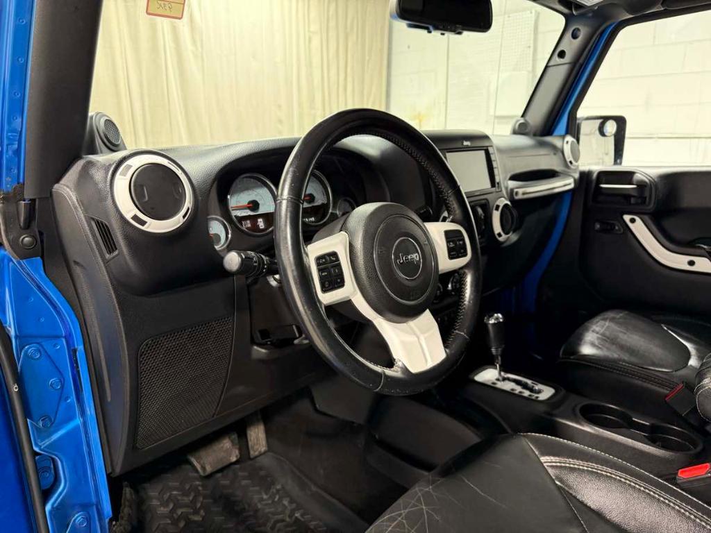 used 2014 Jeep Wrangler Unlimited car, priced at $16,985