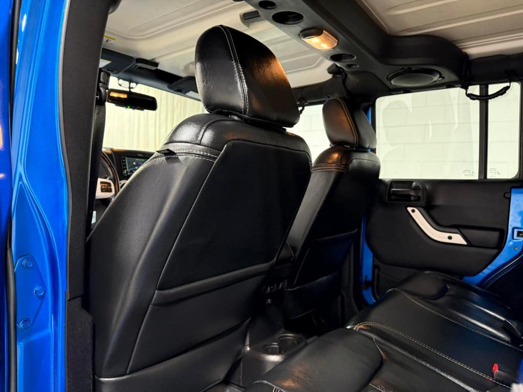 used 2014 Jeep Wrangler Unlimited car, priced at $16,985