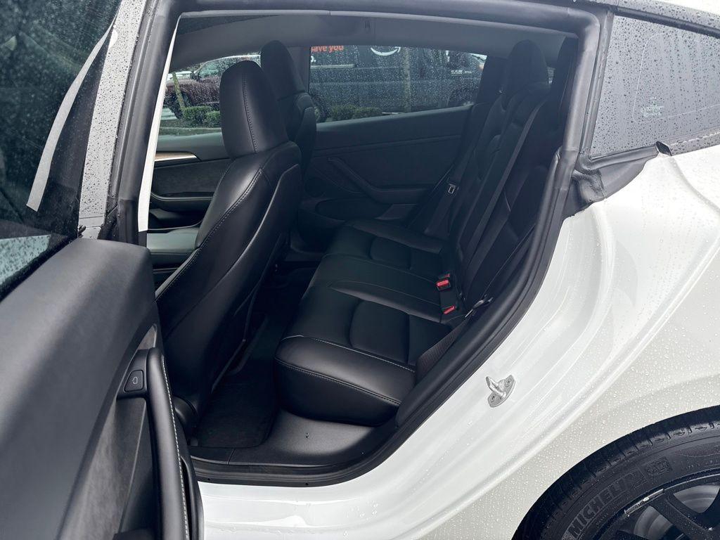 used 2023 Tesla Model 3 car, priced at $27,671