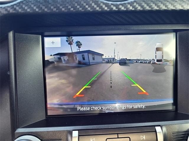 used 2021 Ford Mustang car, priced at $22,997