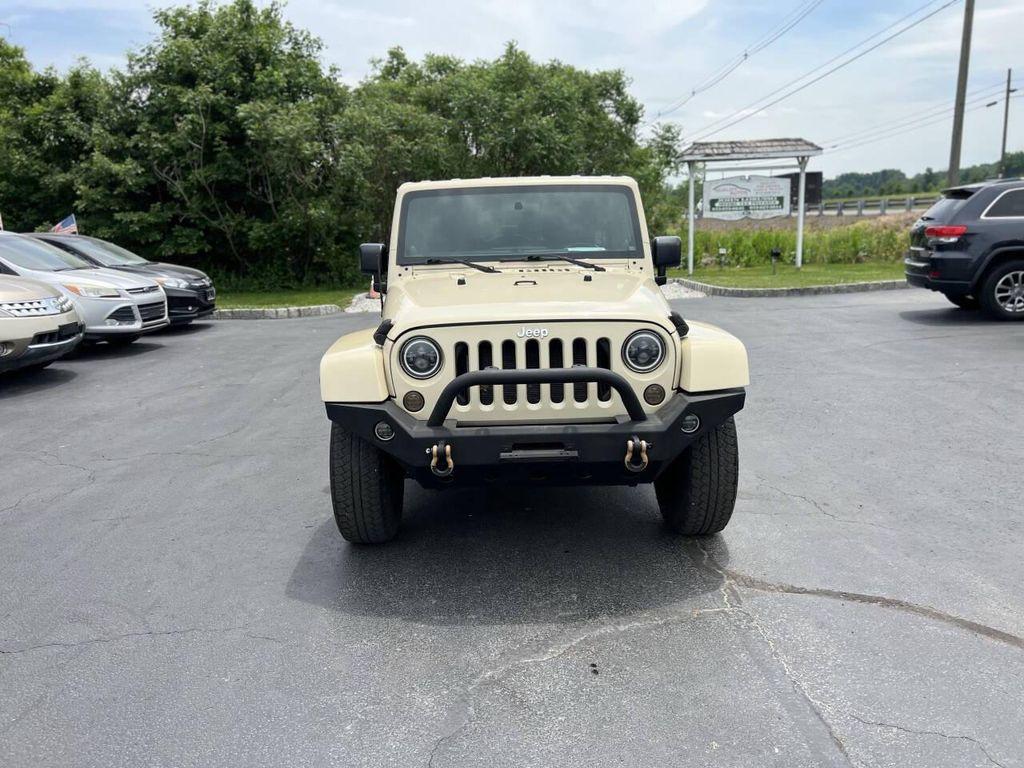 used 2011 Jeep Wrangler Unlimited car, priced at $12,478