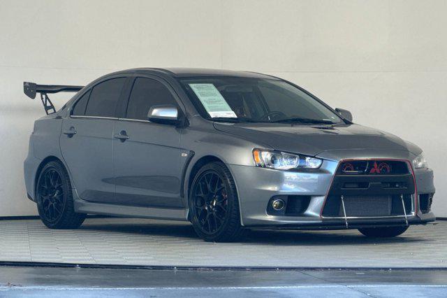used 2013 Mitsubishi Lancer Evolution car, priced at $31,999