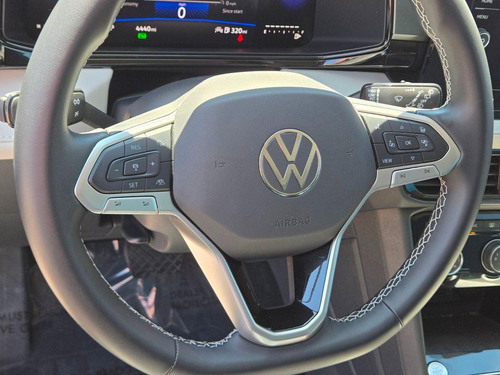 used 2025 Volkswagen Taos car, priced at $22,587