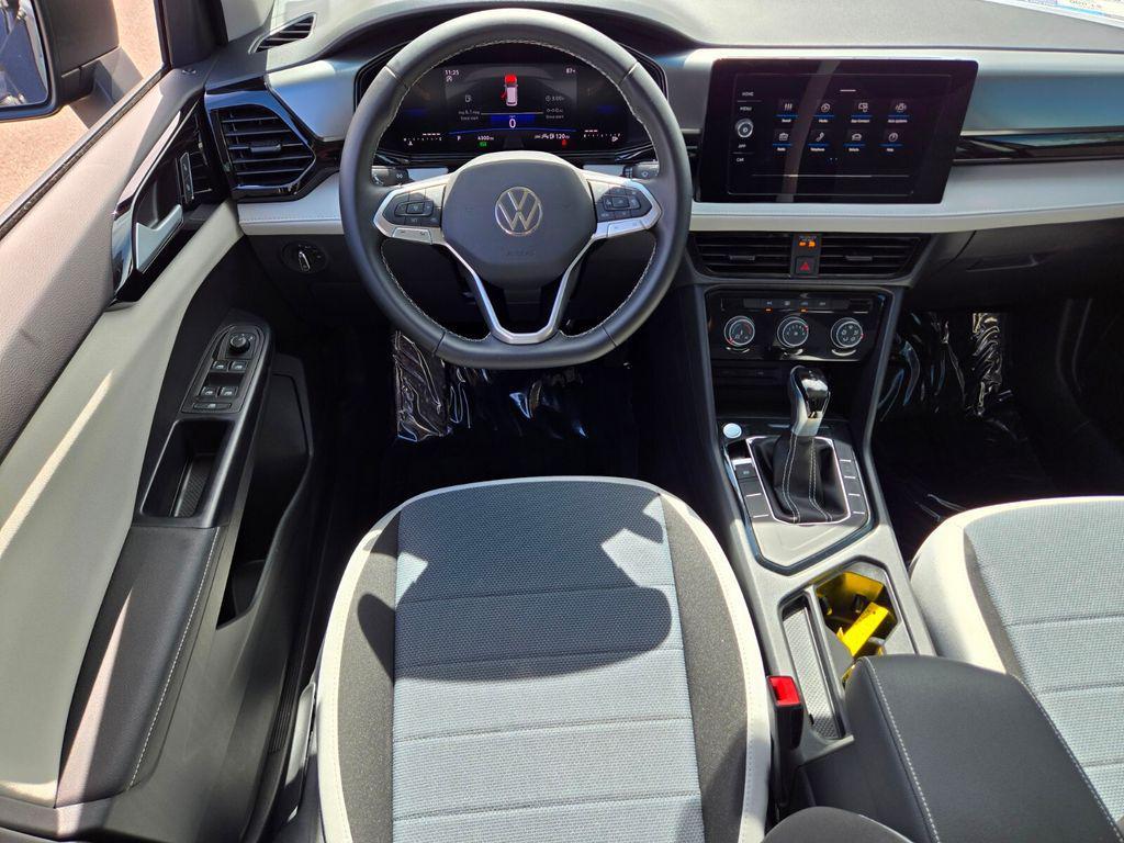 used 2025 Volkswagen Taos car, priced at $22,587