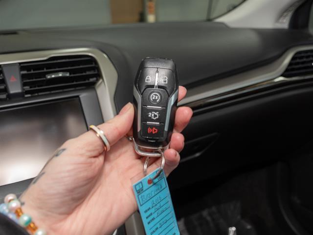 used 2016 Ford Fusion car, priced at $8,900