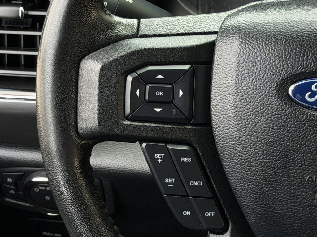 used 2018 Ford F-150 car, priced at $19,115