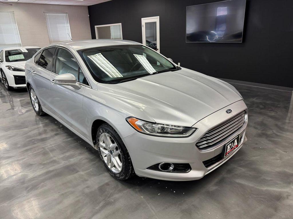 used 2014 Ford Fusion car, priced at $6,900