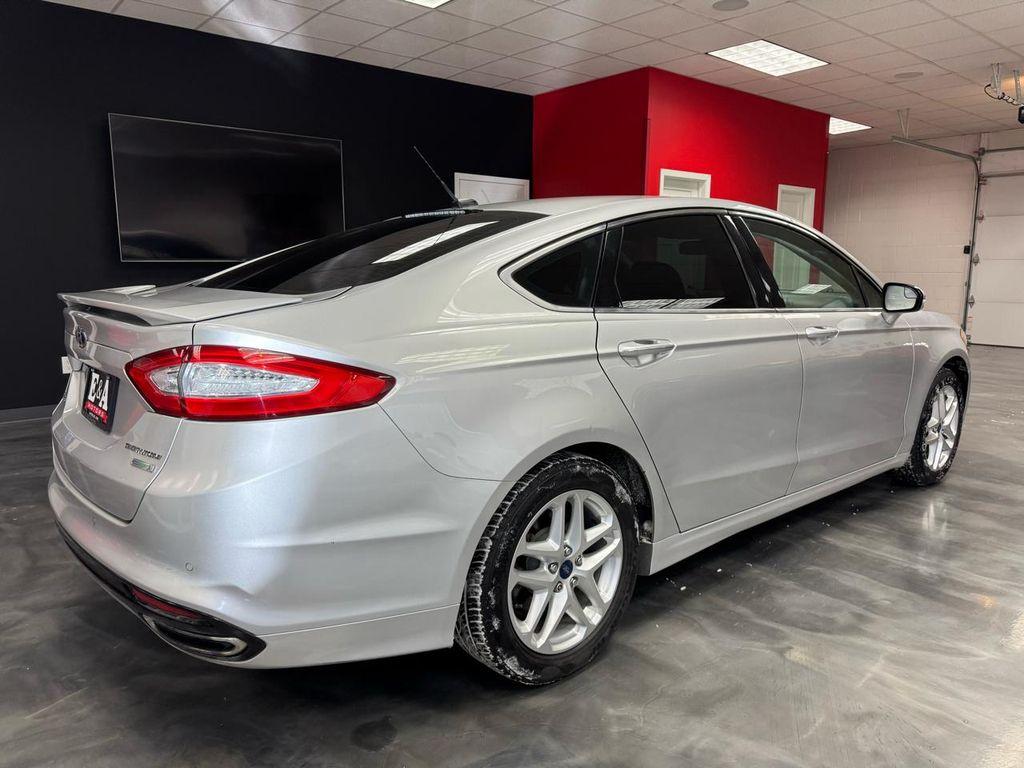 used 2014 Ford Fusion car, priced at $6,900