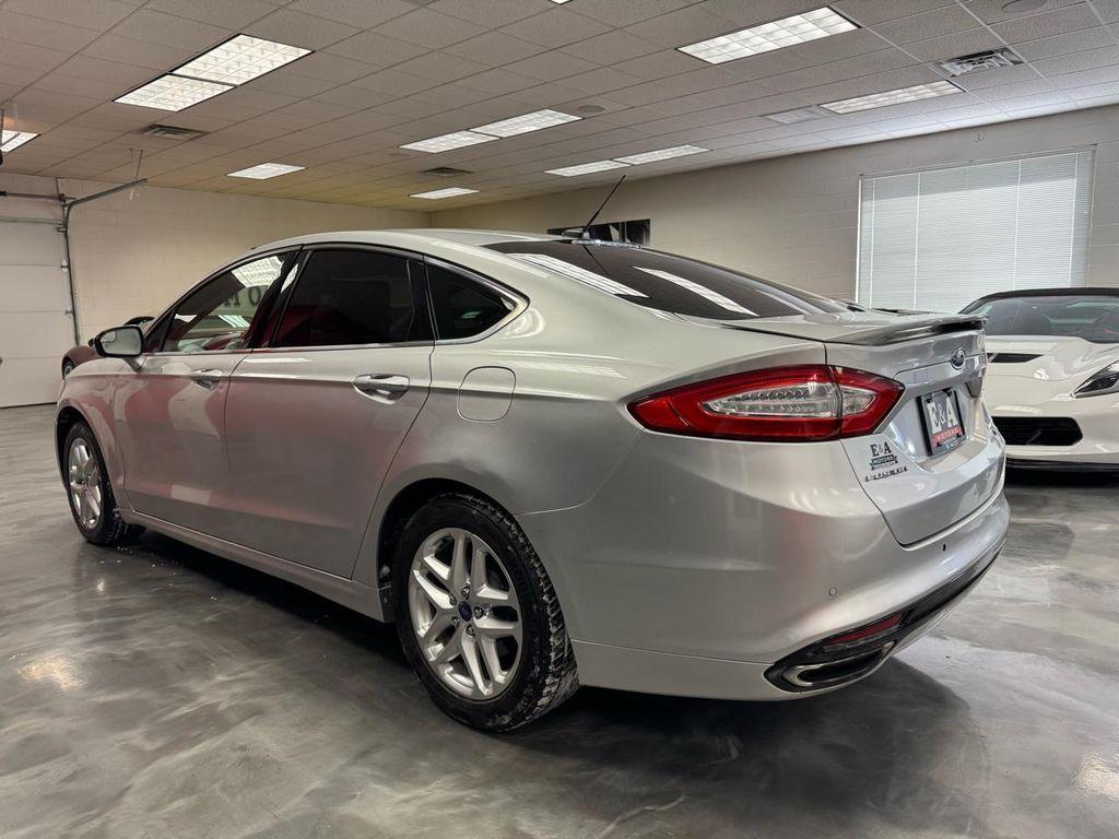 used 2014 Ford Fusion car, priced at $6,900