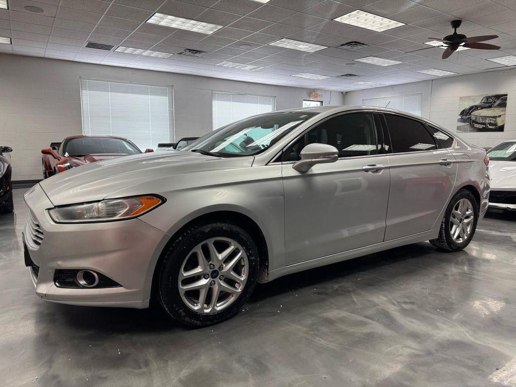 used 2014 Ford Fusion car, priced at $6,900