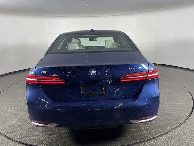 used 2024 BMW i5 car, priced at $55,999