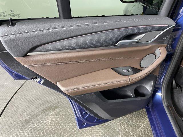 used 2024 BMW X4 car, priced at $62,999