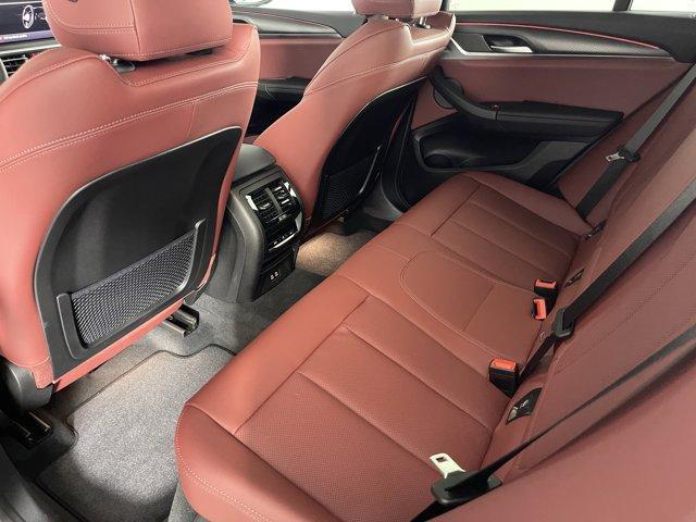 used 2025 BMW X4 car, priced at $58,665