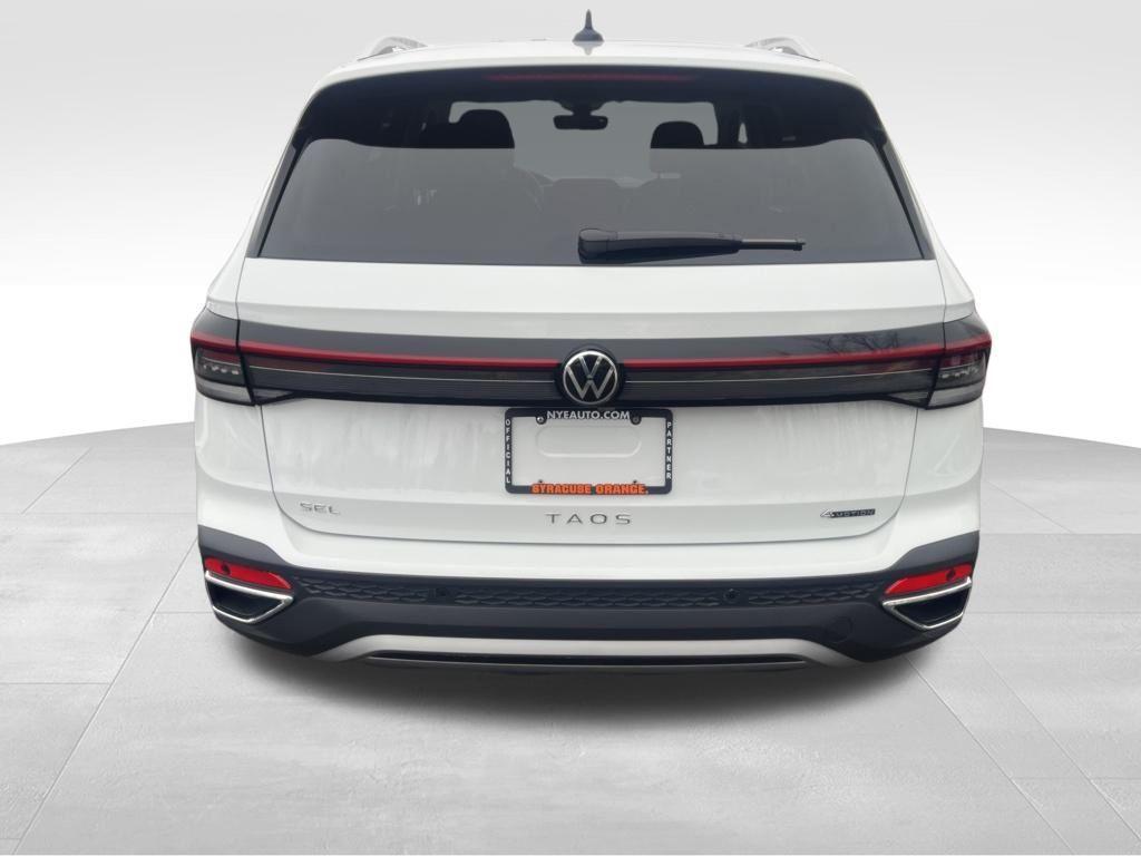 used 2025 Volkswagen Taos car, priced at $30,494