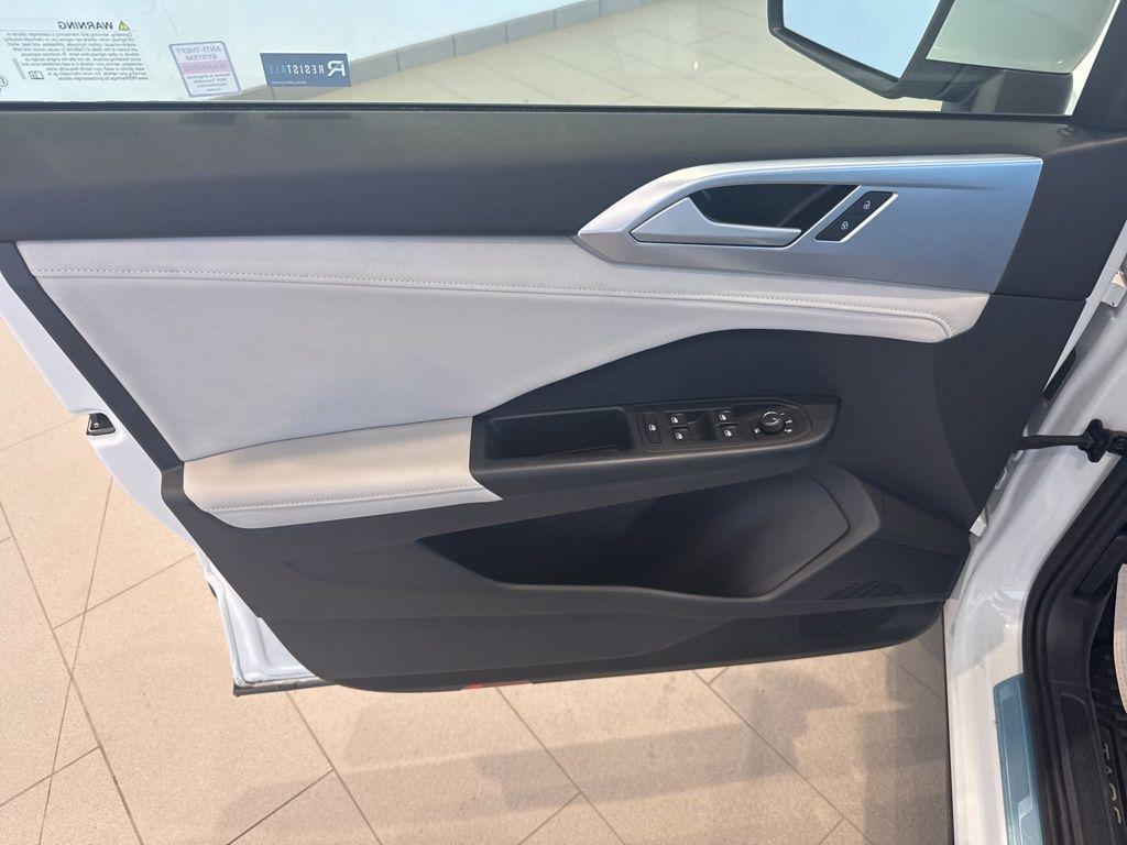 used 2025 Volkswagen Taos car, priced at $26,281