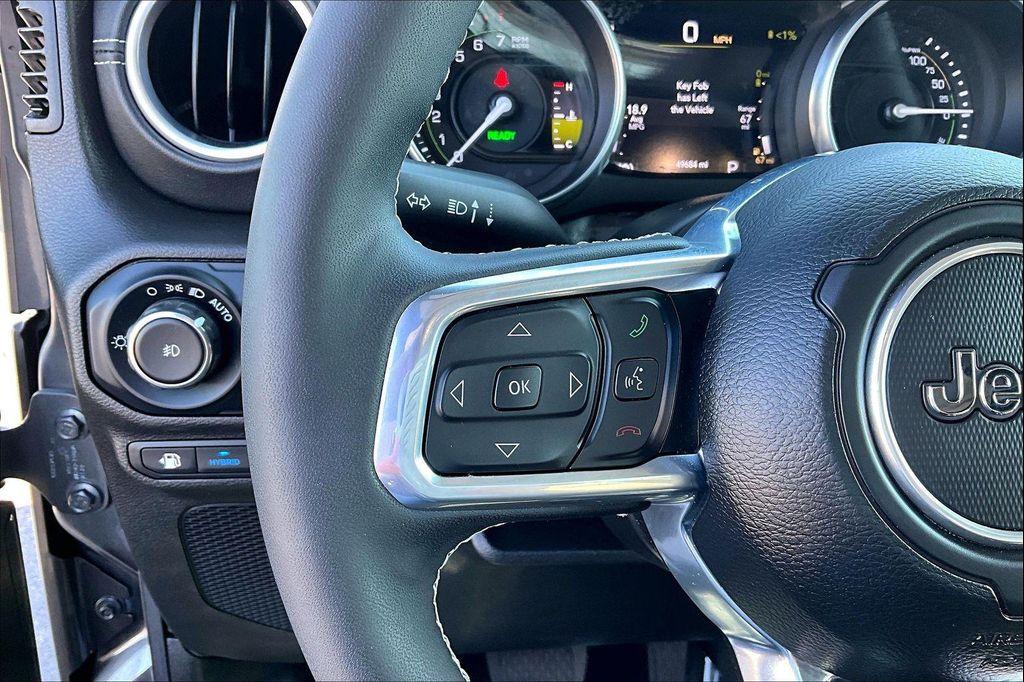 used 2023 Jeep Wrangler 4xe car, priced at $27,238