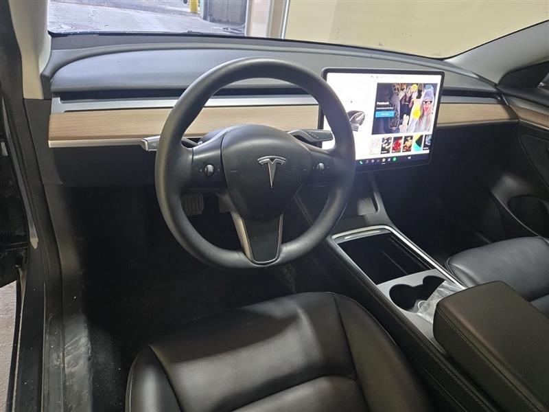 used 2023 Tesla Model 3 car, priced at $19,400
