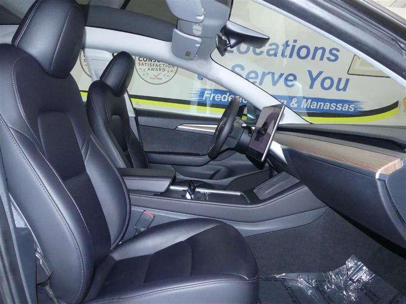 used 2023 Tesla Model 3 car, priced at $30,000