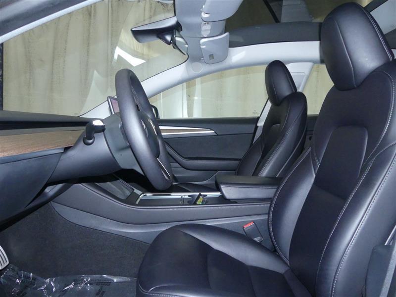 used 2023 Tesla Model 3 car, priced at $30,000