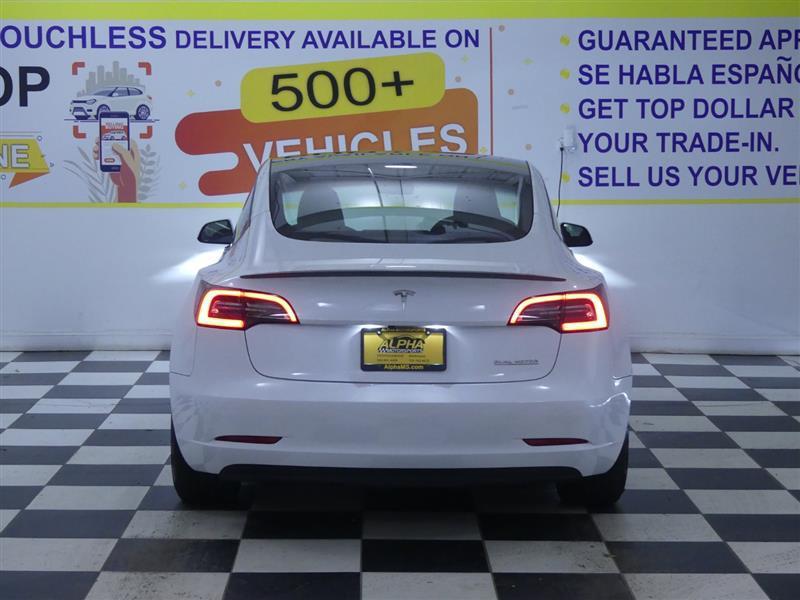 used 2023 Tesla Model 3 car, priced at $31,500