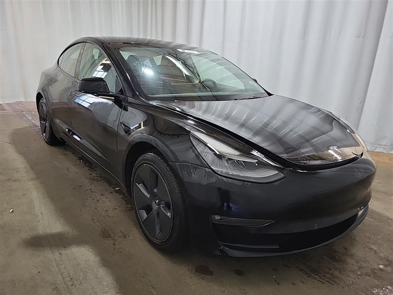 used 2022 Tesla Model 3 car, priced at $20,000