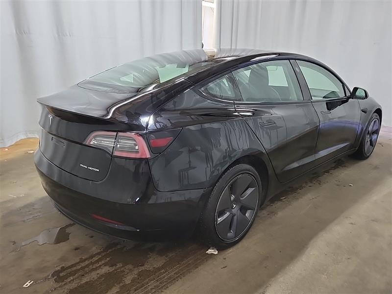 used 2022 Tesla Model 3 car, priced at $20,000