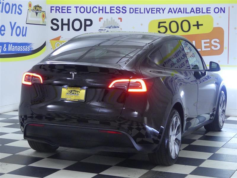 used 2024 Tesla Model Y car, priced at $31,000