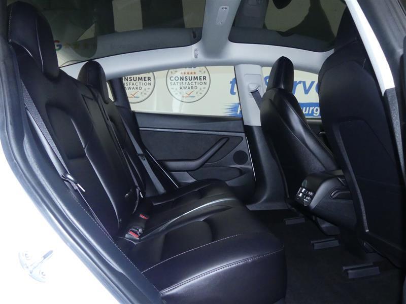 used 2023 Tesla Model 3 car, priced at $20,000