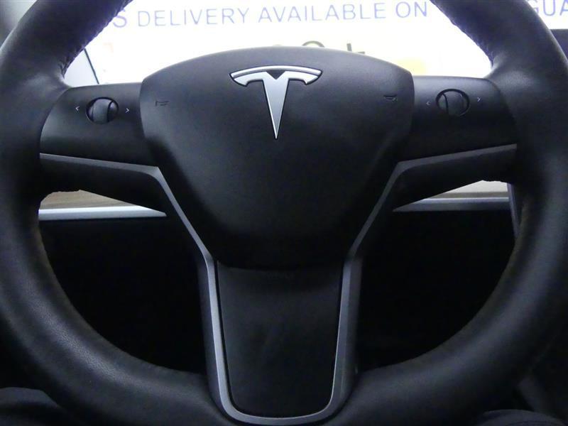 used 2023 Tesla Model 3 car, priced at $20,000