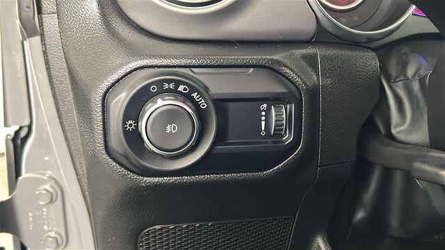 used 2023 Jeep Wrangler car, priced at $24,348